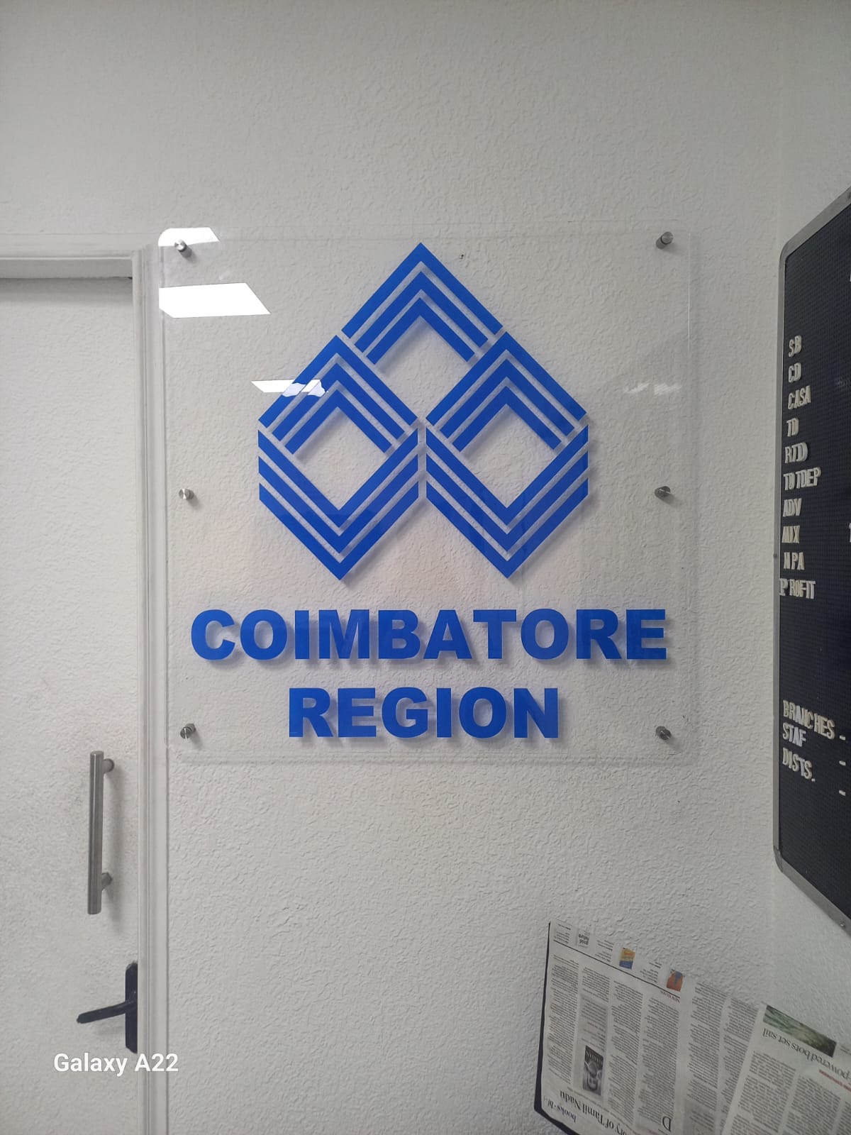 Indian Overseas Bank — Coimbatore region · acrylic-mounted interior branding, signage by Choice Advertising
